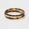 5 brazaletes para dama tortuga/oro marca A New Day