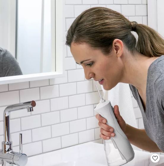 Irrigador bucal inalámbrico recargable marca Waterpik - Imagen 2